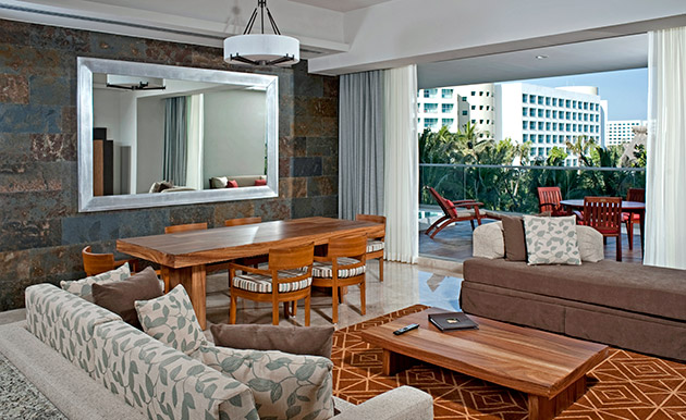 Vidanta Grand Luxxe living room, with view of outside